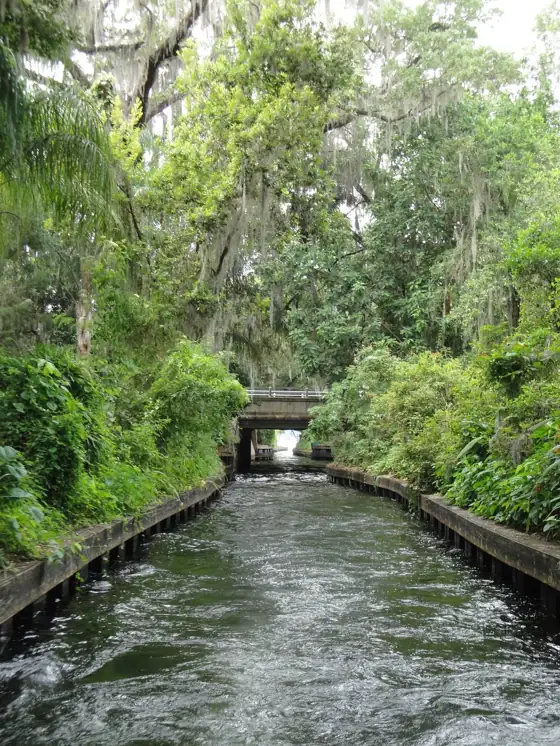 A narrow canal under moss-draped oaks in Winter Park